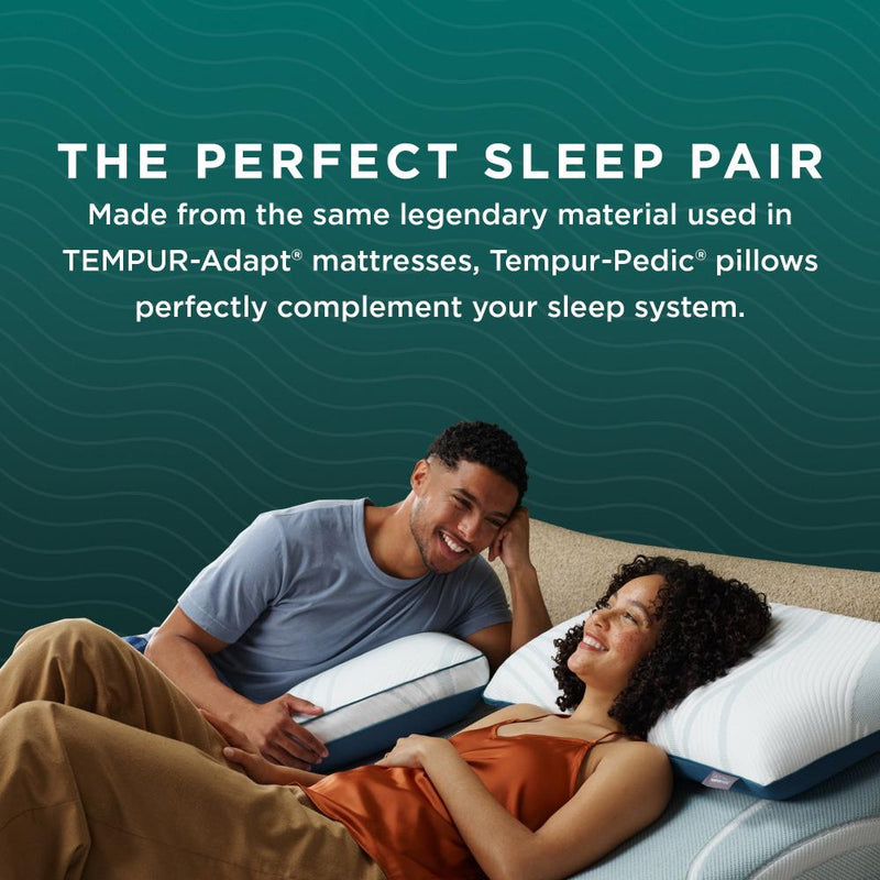 Couple relaxing with the Tempur-Pedic TEMPUR-Adapt® ProLo Pillow, showcasing comfort and complementing the Adapt® mattresses. Available at Sleepology Mattress Shop.